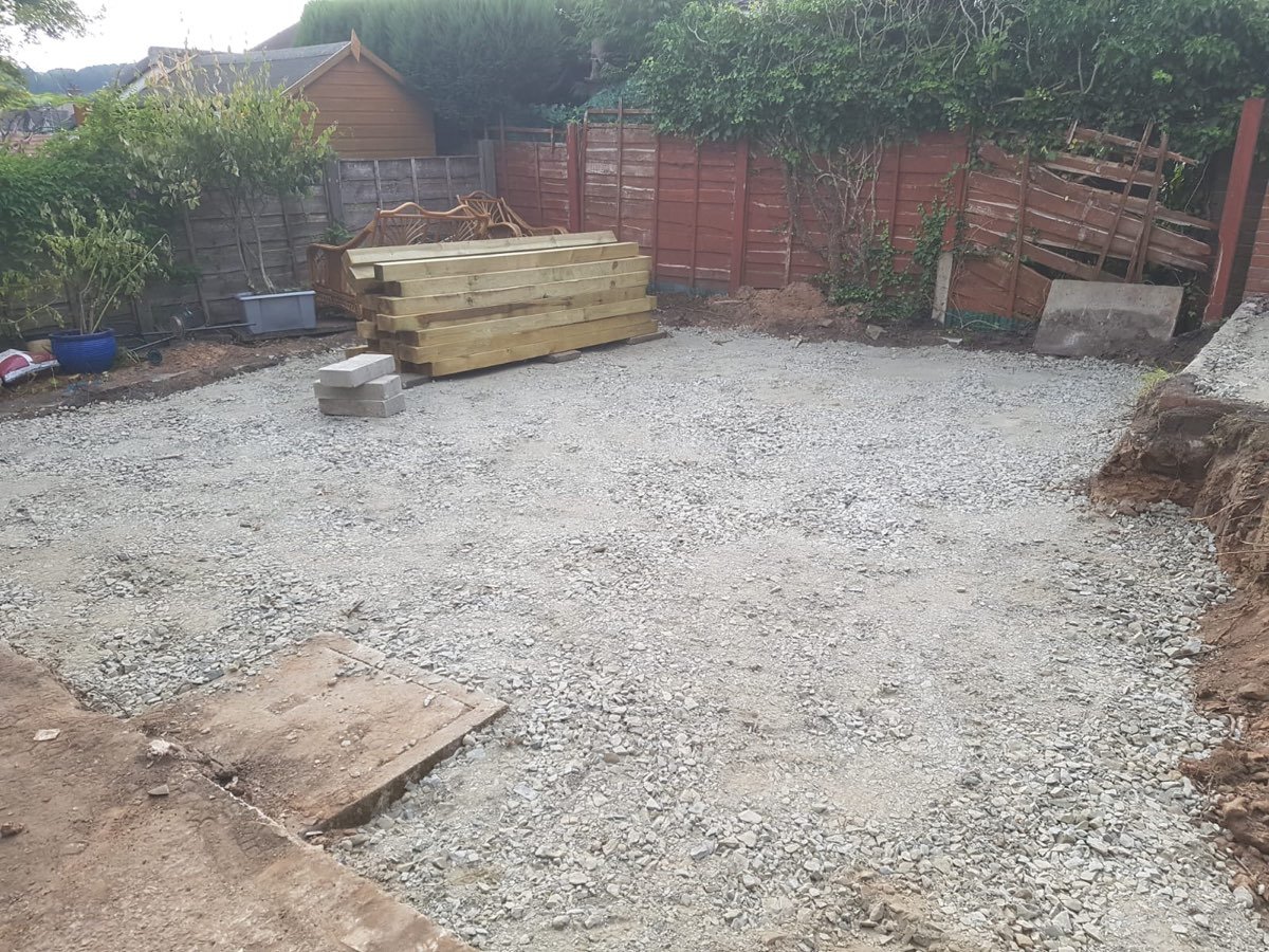 Domestic garden site cleared and prepared with hardcore sub-base