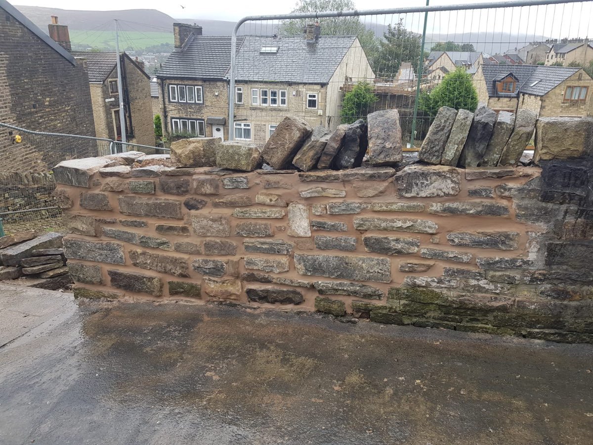 Rugged natural stone boundary wall