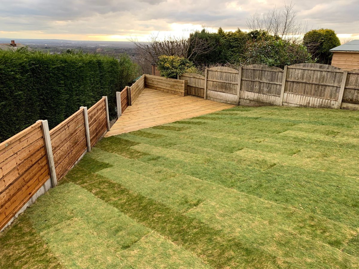 Freshly laid natural turf lawn in a hillside garden