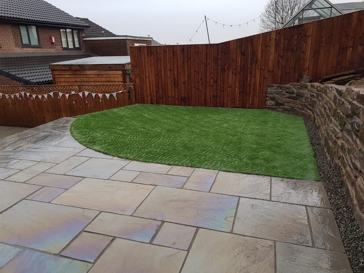 Artificial grass lawn with porcelain patio and new fencing